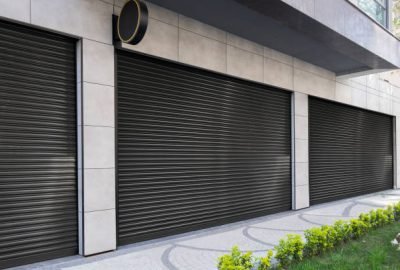Closed Shop due to lockdown With Black metal roller shutter door